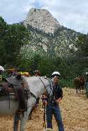 Preparing to mount horse at the stockade after lunch on circle training ride